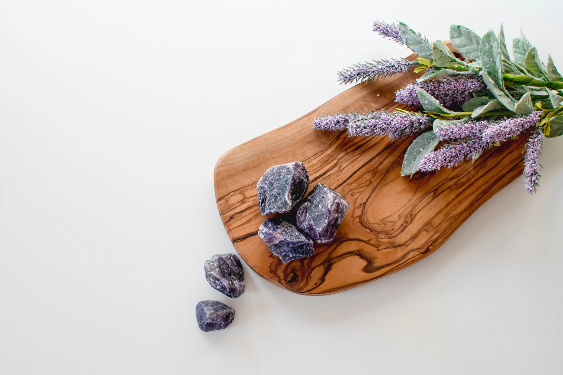 Lavender and purple stones in a quiet still life